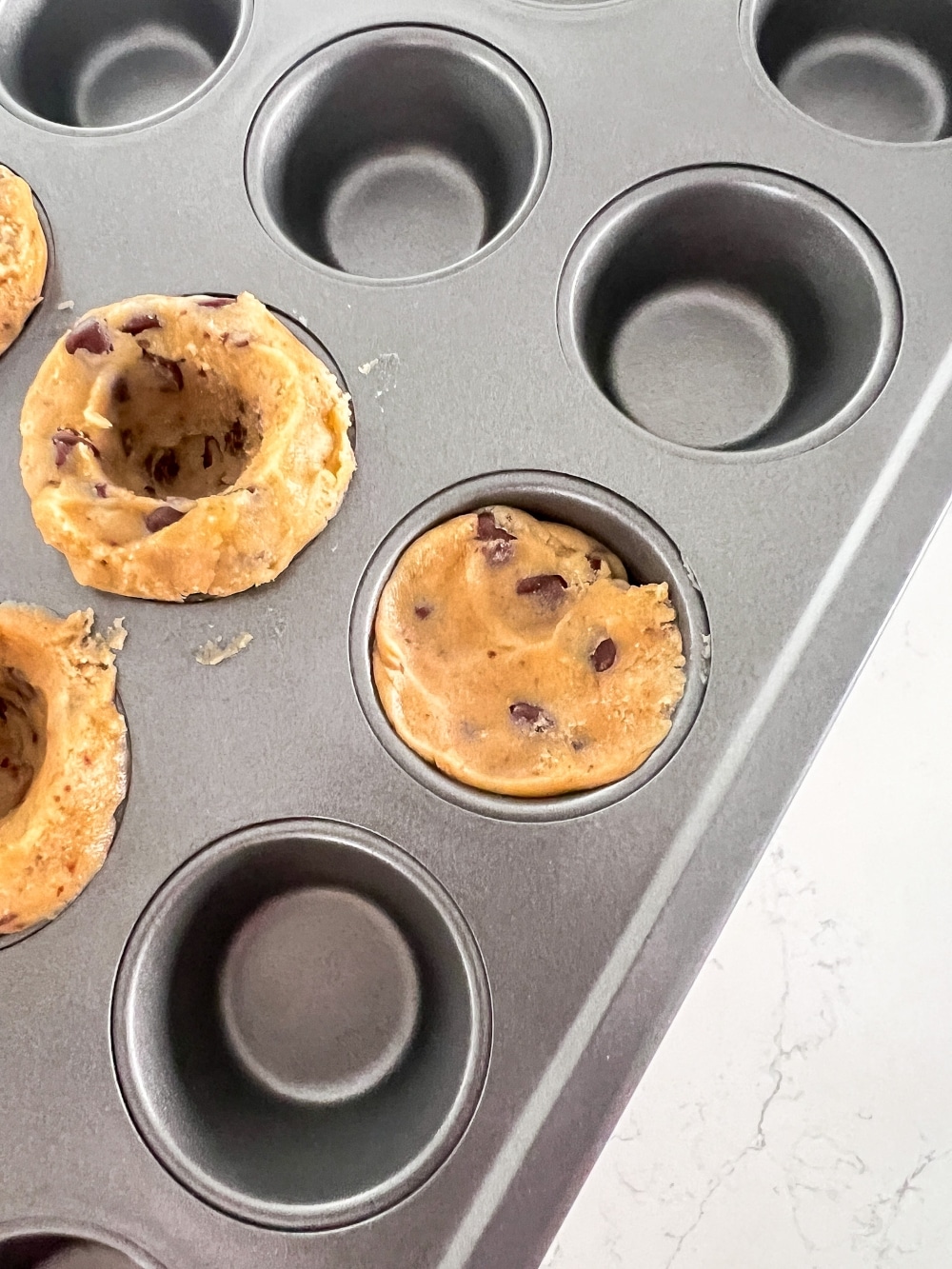 Fourth of July S'mores Cookie Cups.  A festive treat that tastes just like a classic toasted s'mores, with a delicious combination of crunchy, melty, and gooey textures.