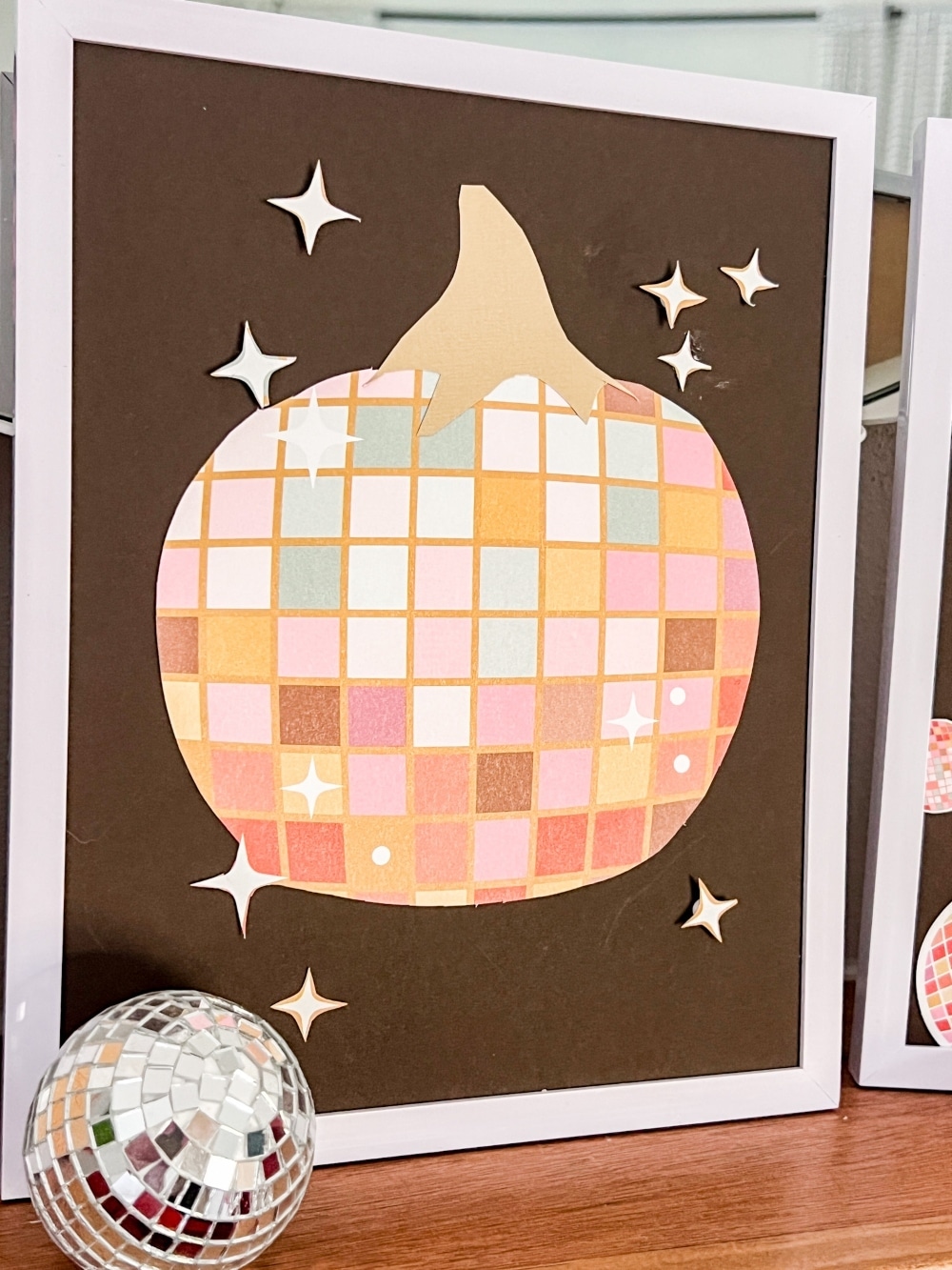 DIY Disco Halloween Art Using Scrapbook Paper. Create festive DIY disco-themed Halloween art using the scrapbook paper with these easy-to-follow steps for three spooky cute framed pieces.