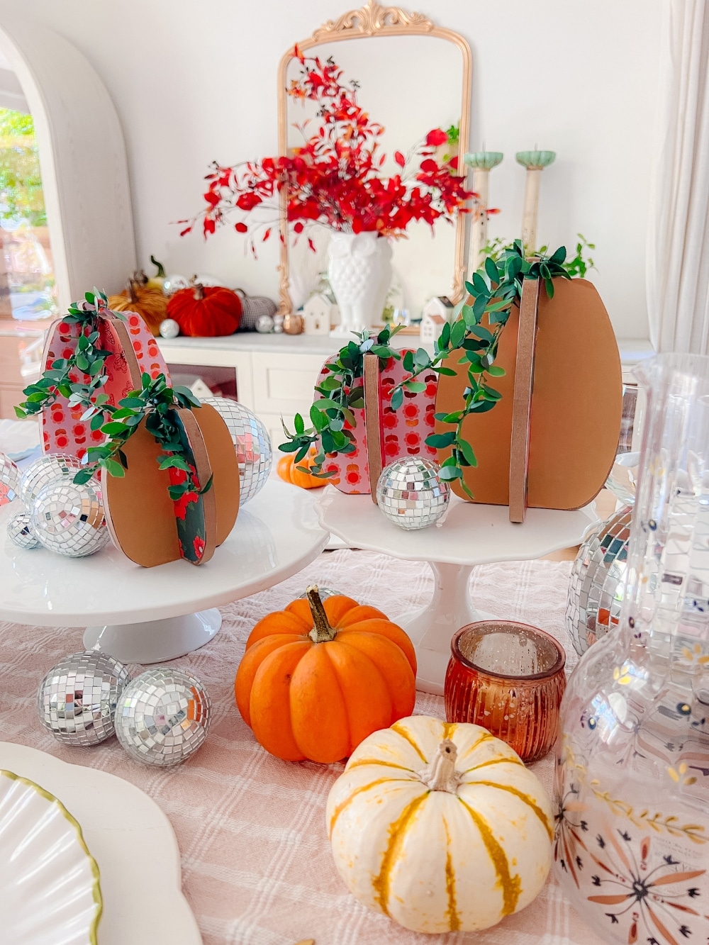 Fall Centerpiece with Decoupage Pumpkins. This pumpkin fall centerpiece is a fun and easy craft idea you can make with your kids to add a personal and festive touch to your fall decor.