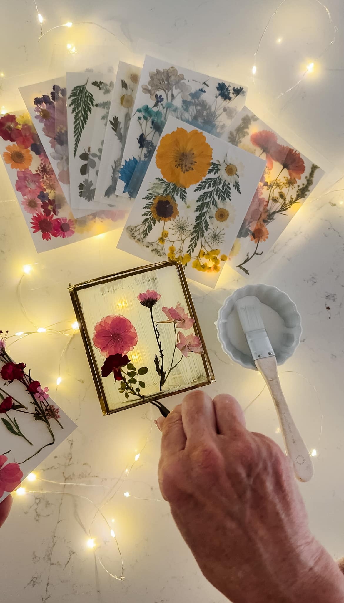 DIY Spring Flower Lanterns. Spring is the perfect time to create DIY spring flower lanterns with dried flowers, Mod Podge, and glowing candles!