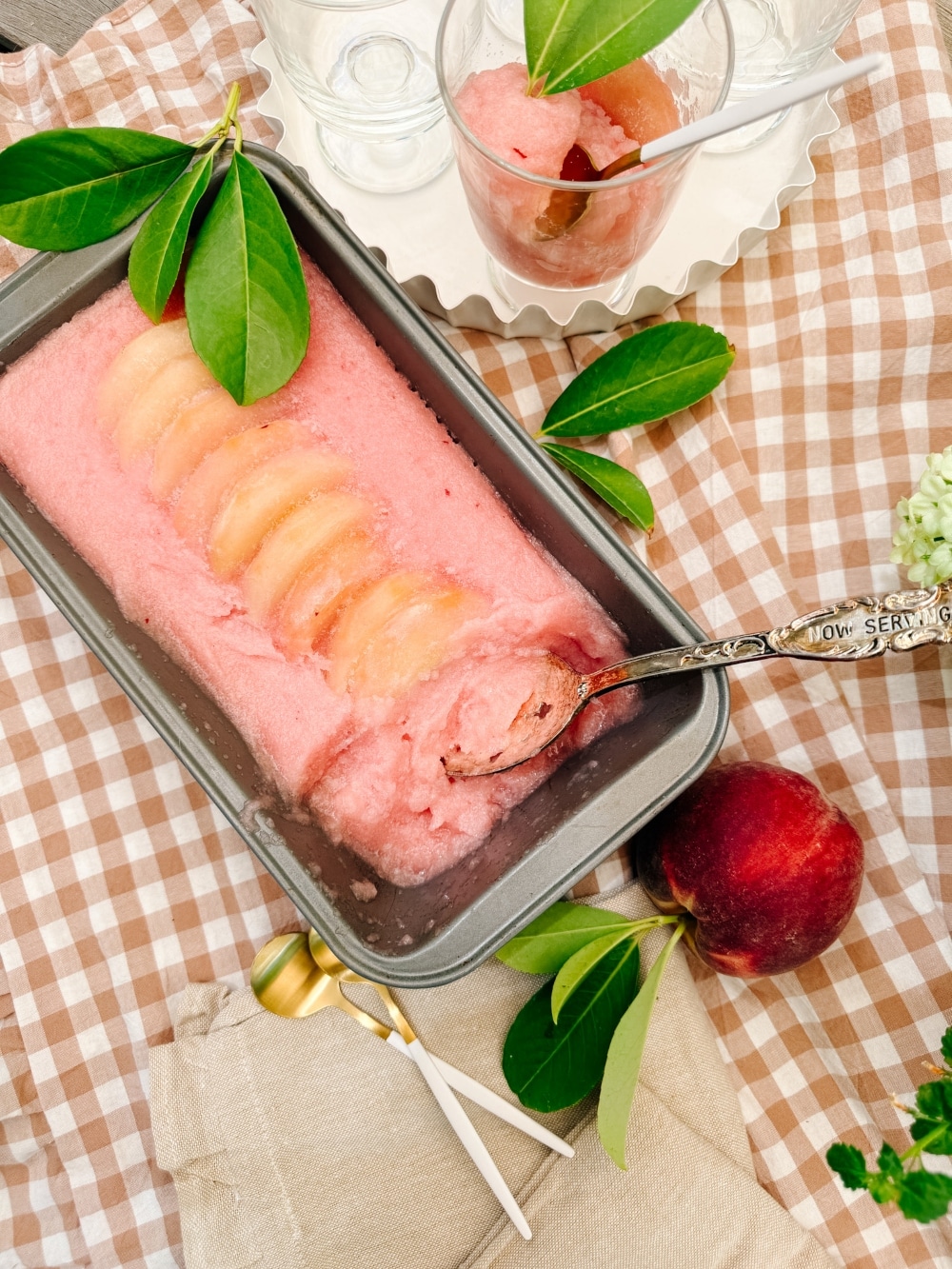 This 3-ingredient peach sorbet is the perfect refreshing treat for hot days, combining juicy peaches, a touch of sweetness, and a dash of lemon for a simple, flavorful dessert that's as easy to make as it is delicious!