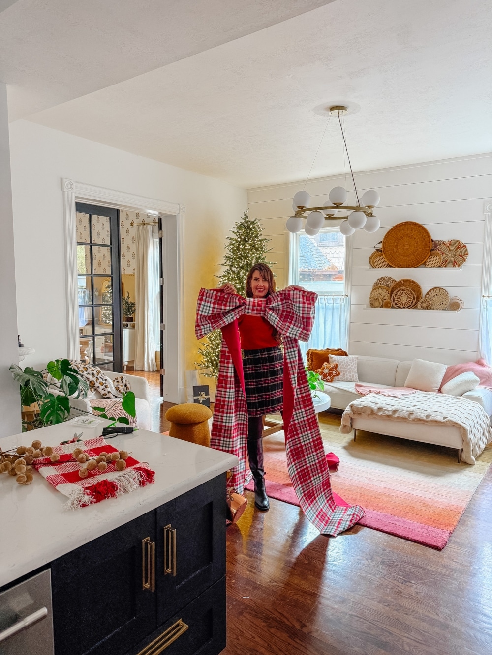 Make an Easy Giant Christmas Bow. Turn inexpensive table runners into a show-stopping giant Christmas bow with this easy step-by-step tutorial.