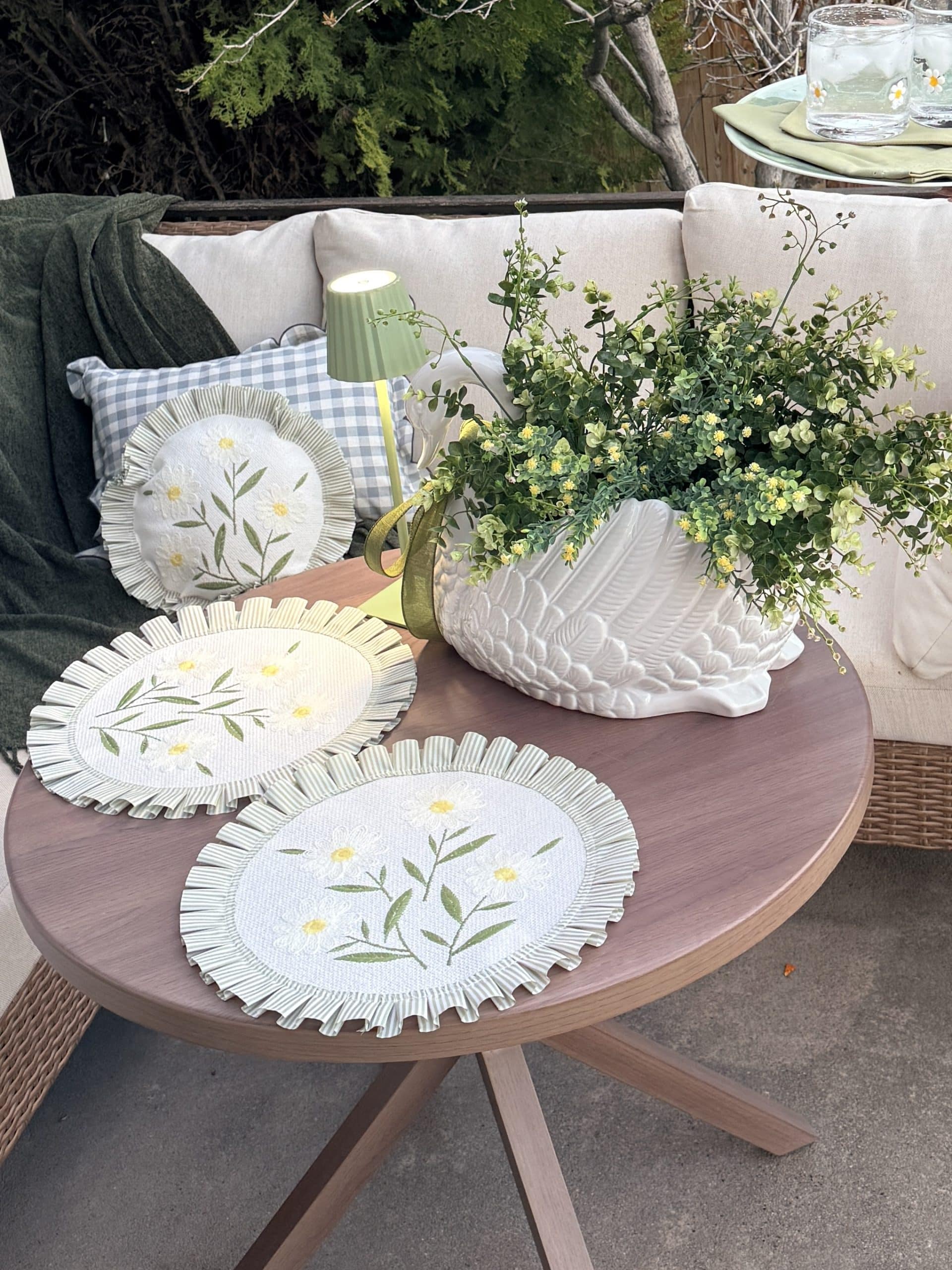10-Minute DIY Ideas for Spring & Summer Entertaining. Create a charming spring and summer porch with these easy 10-minute DIY entertaining ideas featuring no-sew placemat pillows, a swan planter centerpiece and beautiful seasonal finds from Hobby Lobby.