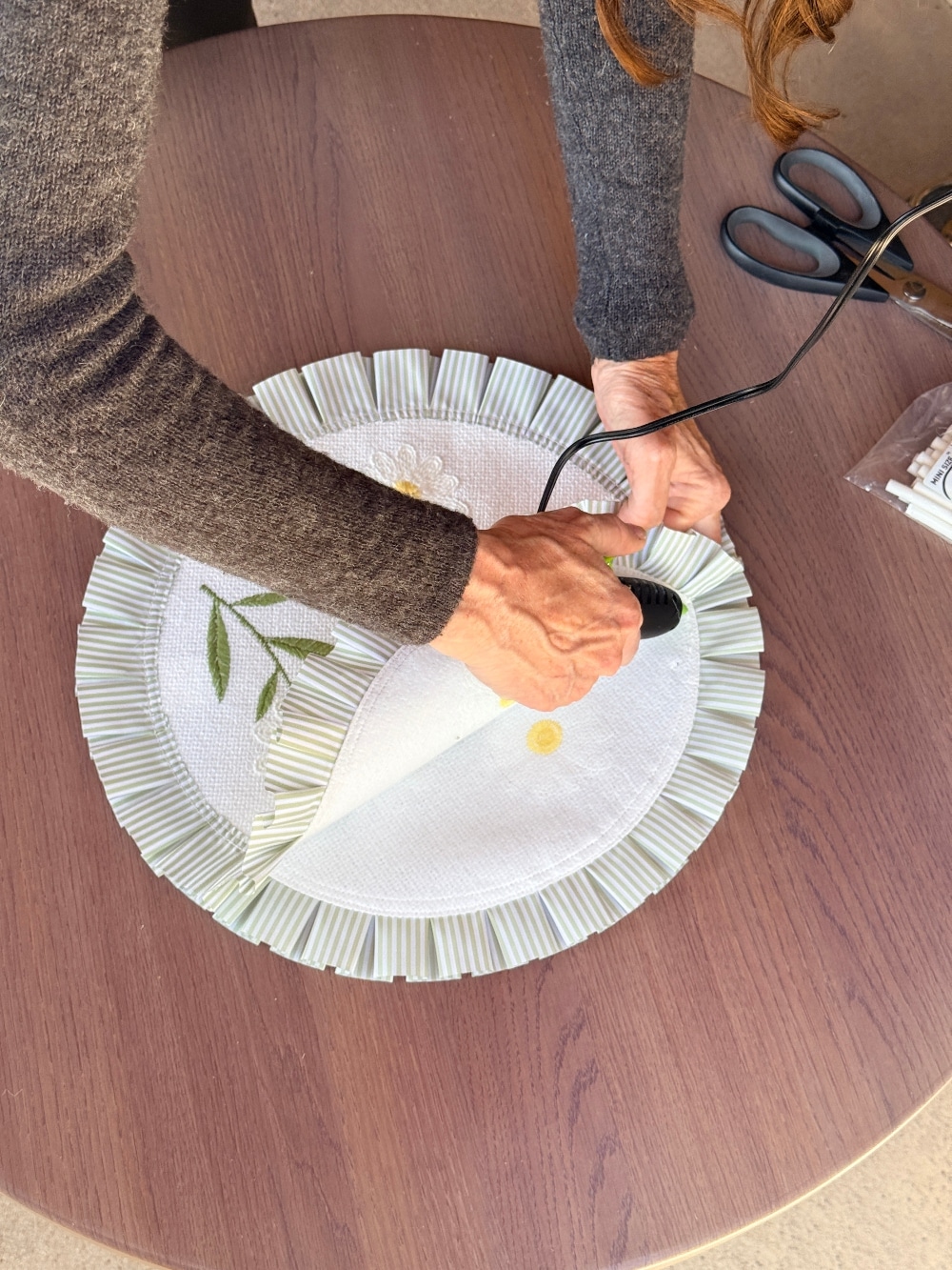 10-Minute DIY Ideas for Spring & Summer Entertaining. Create a charming spring and summer porch with these easy 10-minute DIY entertaining ideas featuring no-sew placemat pillows, a swan planter centerpiece and beautiful seasonal finds from Hobby Lobby.
