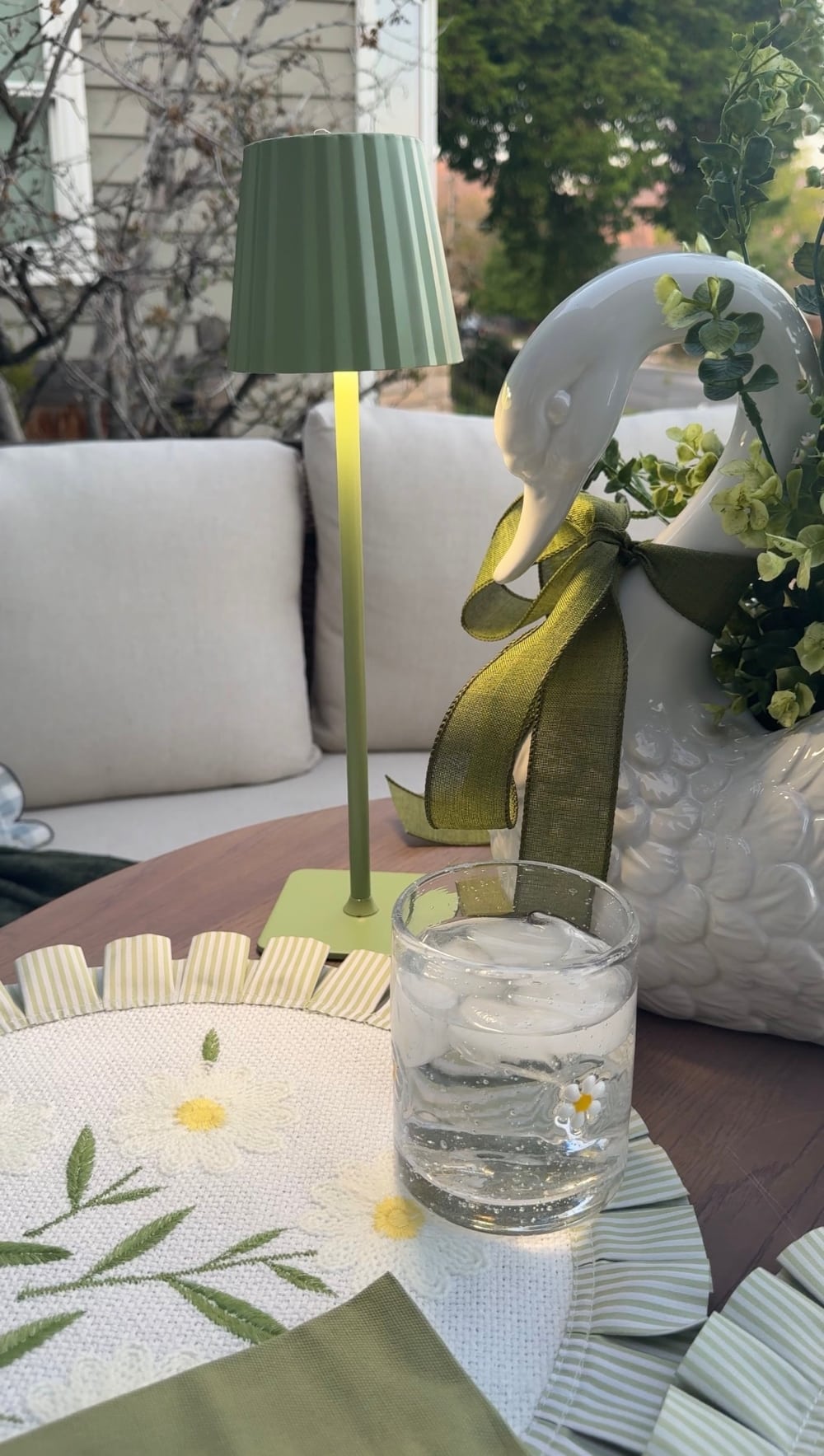10-Minute DIY Ideas for Spring & Summer Entertaining. Create a charming spring and summer porch with these easy 10-minute DIY entertaining ideas featuring no-sew placemat pillows, a swan planter centerpiece and beautiful seasonal finds from Hobby Lobby.