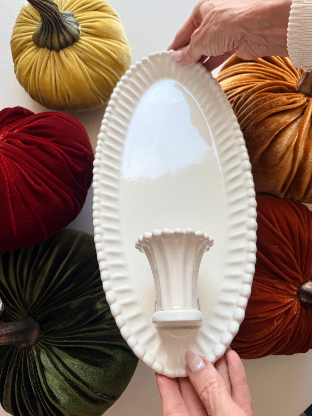 $30 Ceramic Candle Wall Sconces That Look Like Designer Lighting. Create the cozy glow of designer lighting with affordable ceramic candle wall sconces and realistic flameless taper candles.