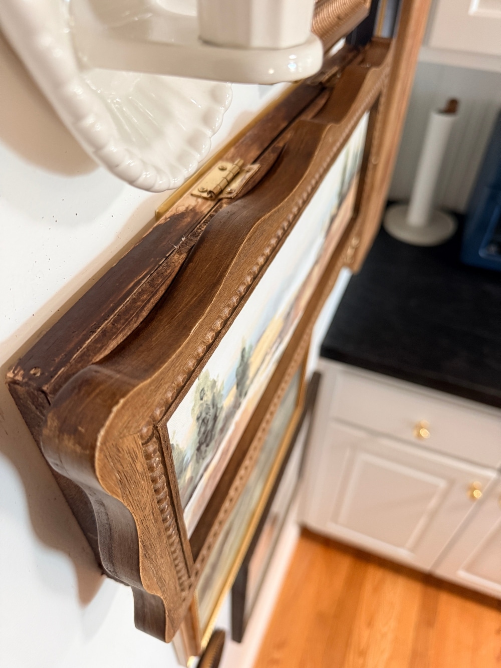 How to Hide a Wall Switch Plate with a Painting. Learn how to hide a wall switch plate with a painting by creating a simple hinged frame that keeps every switch accessible.