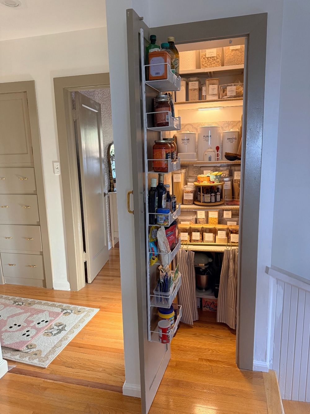 This tiny pantry makeover proves that you don’t need a huge space to create beautiful, functional storage. I transformed the original pantry in my 1932 Tudor with smart storage solutions, wallpaper, pretty containers, a baking station, appliance storage, and vintage-inspired details that make every inch work harder.