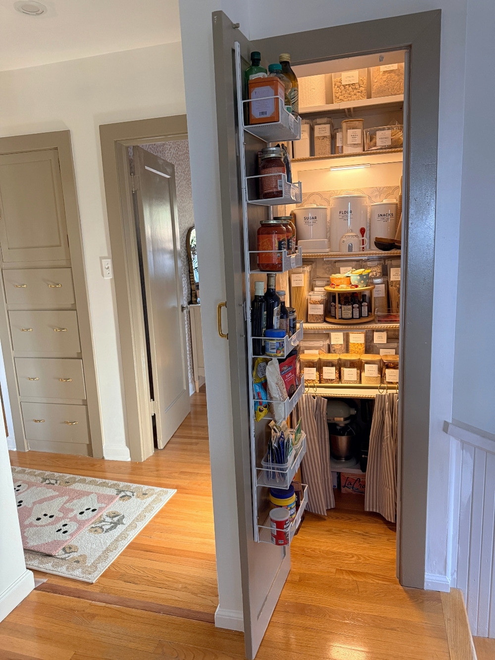 This tiny pantry makeover proves that you don’t need a huge space to create beautiful, functional storage. I transformed the original pantry in my 1932 Tudor with smart storage solutions, wallpaper, pretty containers, a baking station, appliance storage, and vintage-inspired details that make every inch work harder.