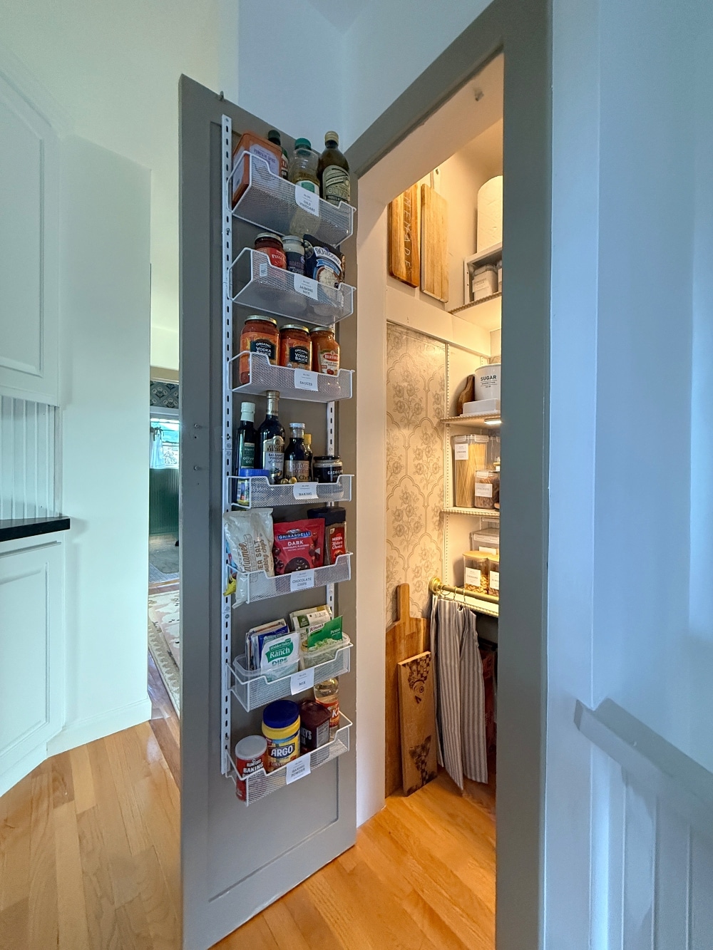 This tiny pantry makeover proves that you don’t need a huge space to create beautiful, functional storage. I transformed the original pantry in my 1932 Tudor with smart storage solutions, wallpaper, pretty containers, a baking station, appliance storage, and vintage-inspired details that make every inch work harder.