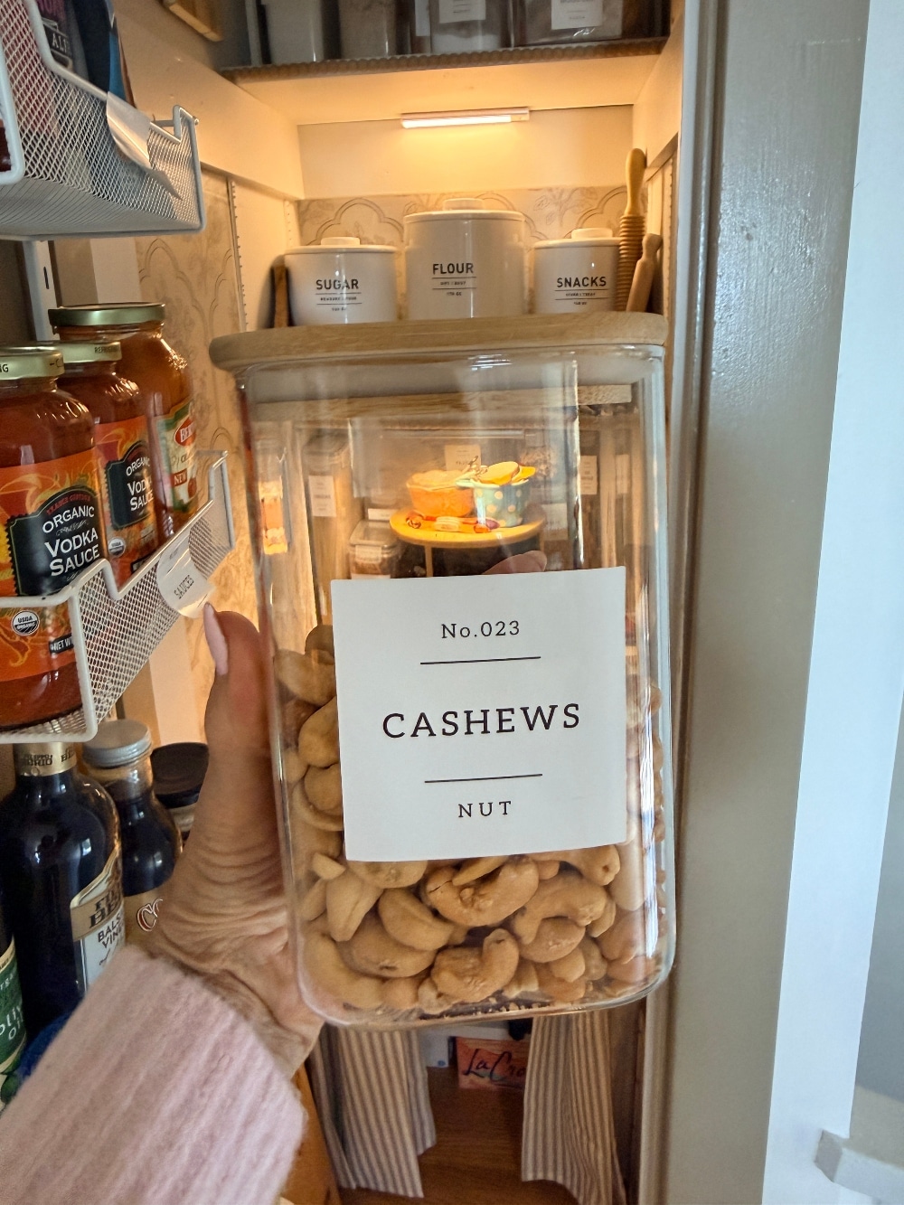 This tiny pantry makeover proves that you don’t need a huge space to create beautiful, functional storage. I transformed the original pantry in my 1932 Tudor with smart storage solutions, wallpaper, pretty containers, a baking station, appliance storage, and vintage-inspired details that make every inch work harder.
