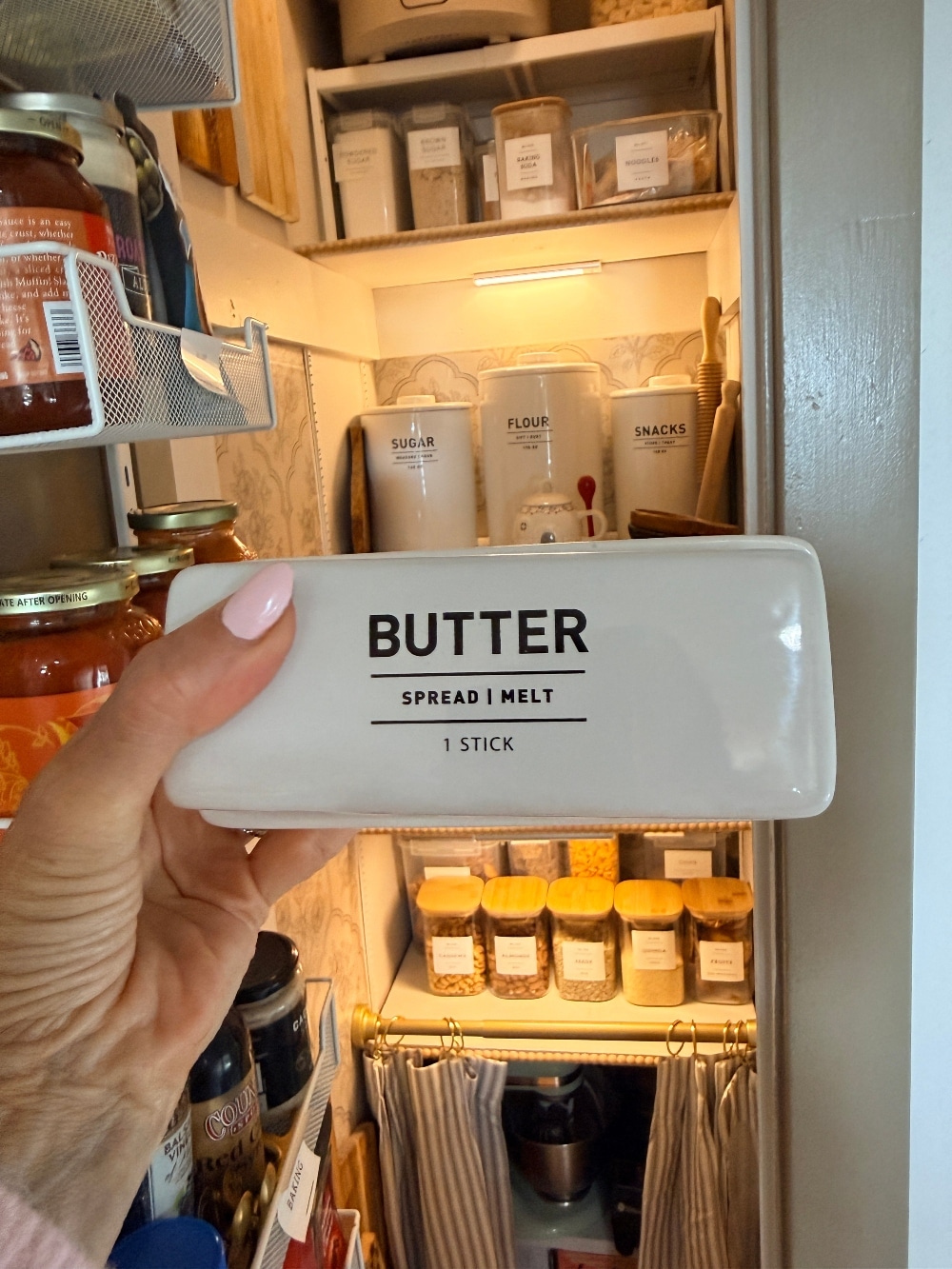 This tiny pantry makeover proves that you don’t need a huge space to create beautiful, functional storage. I transformed the original pantry in my 1932 Tudor with smart storage solutions, wallpaper, pretty containers, a baking station, appliance storage, and vintage-inspired details that make every inch work harder.