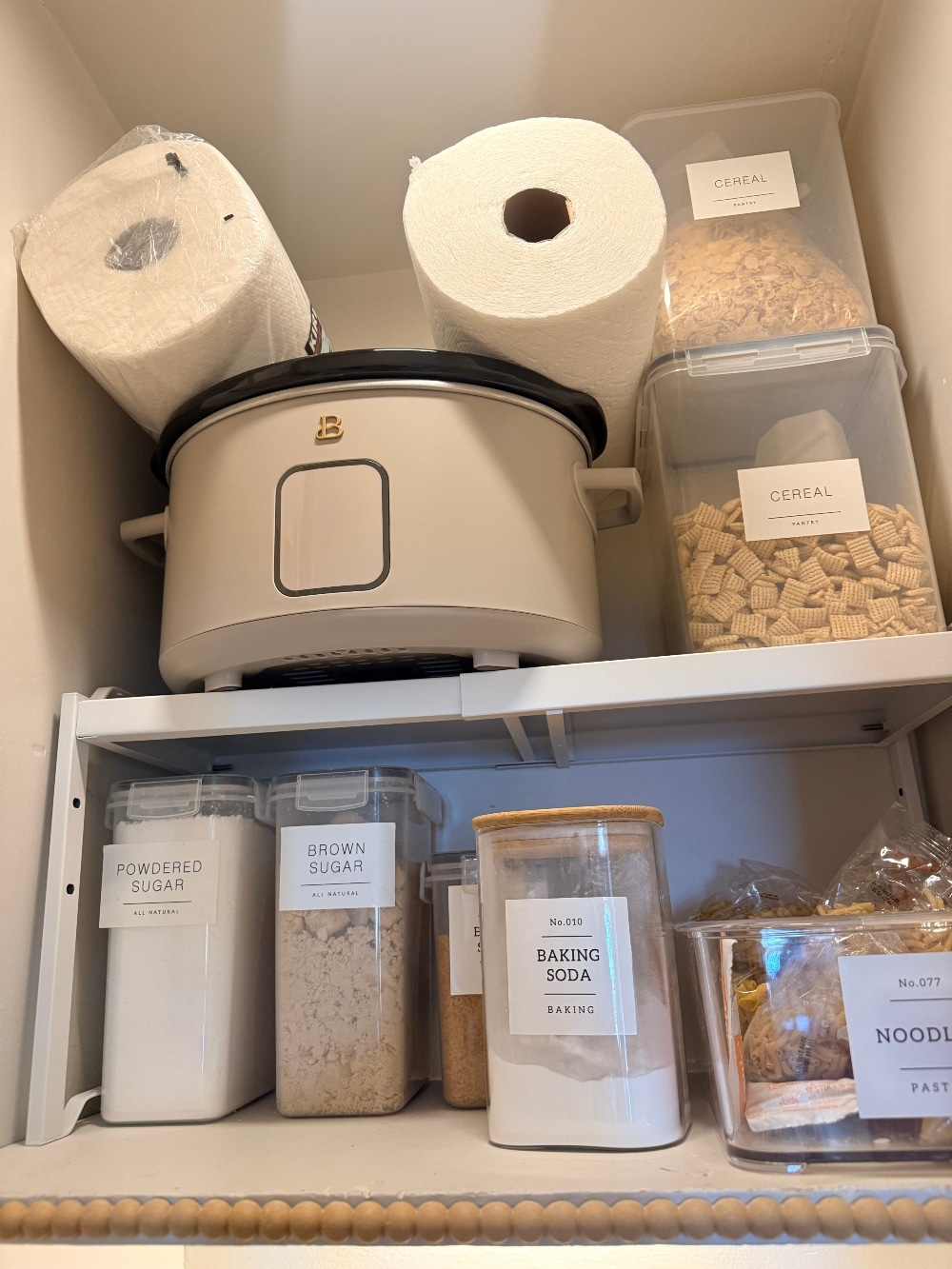 This tiny pantry makeover proves that you don’t need a huge space to create beautiful, functional storage. I transformed the original pantry in my 1932 Tudor with smart storage solutions, wallpaper, pretty containers, a baking station, appliance storage, and vintage-inspired details that make every inch work harder.