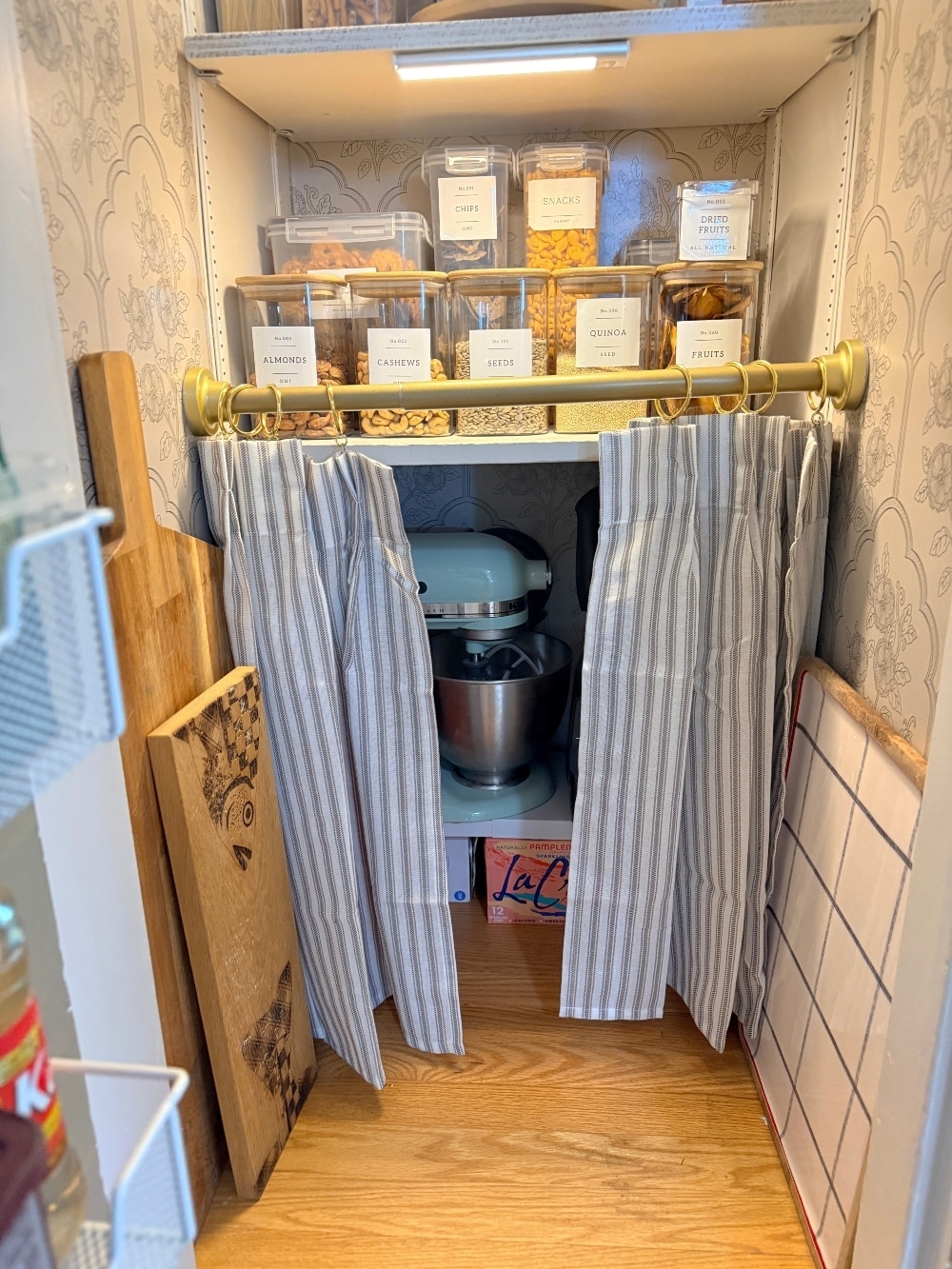 This tiny pantry makeover proves that you don’t need a huge space to create beautiful, functional storage. I transformed the original pantry in my 1932 Tudor with smart storage solutions, wallpaper, pretty containers, a baking station, appliance storage, and vintage-inspired details that make every inch work harder.